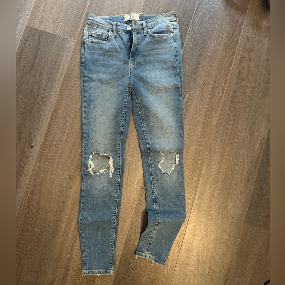 Ripped Knee Skinny Jeans